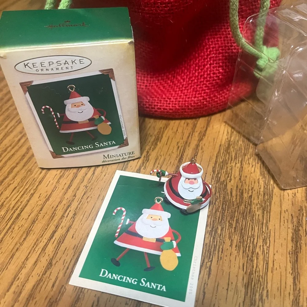 Hallmark Dancing Santa Ornament with Red and Green accents.